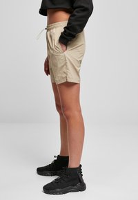 Urban Classics LADIES CRINKLE NYLON SHORTS - Šortky - concrete