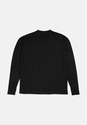 Maglietta nera a maniche lunghe realizzata in morbido cotone. Caratterizzata da un collo rotondo e una vestibilità normale, senza grafiche o decorazioni visibili.