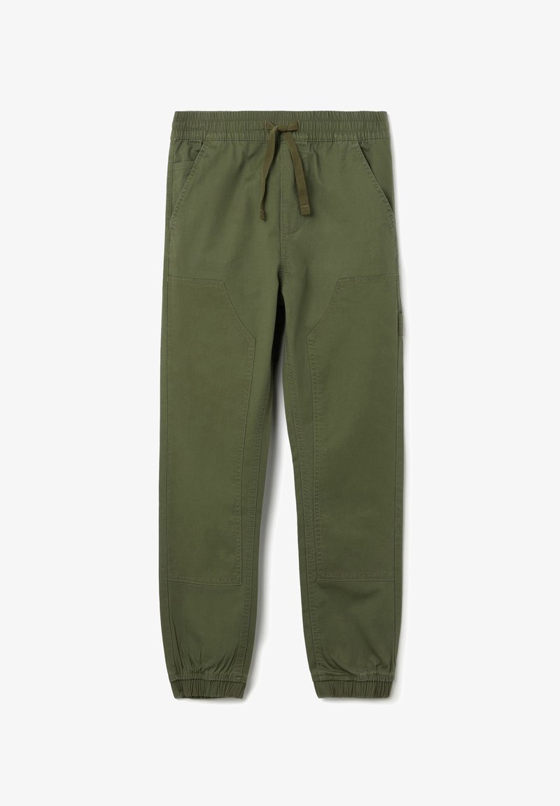 Groene katoenen joggerbroek met een elastische tailleband, trekkoord en taps toelopende boorden, met zijzakken en patchdetails.