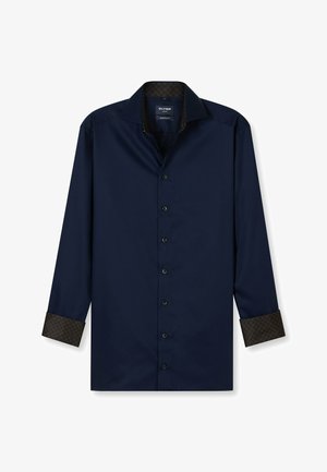 Marineblaue Langarmbluse mit modernem Schnitt. Verfügt über einen gemusterten Kontrast an Halsabschluß und Ärmeln, Knopfverschluss und eine glatte Stoffstruktur.