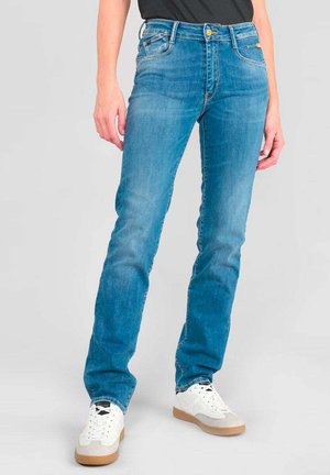 Blue denim jeans with a straight fit, featuring a high waist, five pockets, golden hardware, and subtle fading on the thighs.