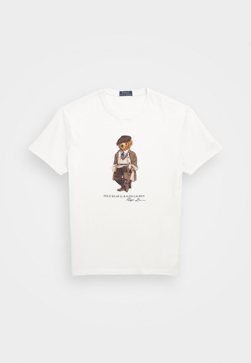 Weißes Baumwoll-T-Shirt mit einem cartoonhaften Bären in Anzug und Hut, mit dem Text "POLO BEAR by RALPH LAUREN" und einer Signatur unter der Illustration.