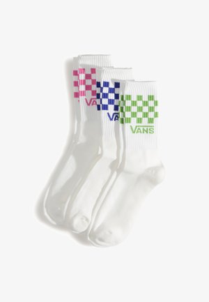 Calze corte bianche in cotone con bordi rigati, decorate con motivi a scacchiera colorati in rosa, blu e verde, con il logo "VANS" su ciascuna.