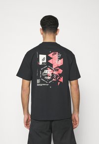 Nike Sportswear T-shirt med print - black