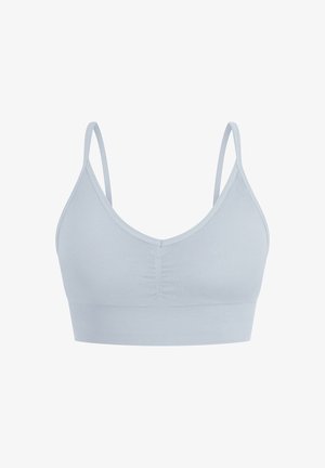 Un reggiseno azzurro chiaro realizzato in tessuto morbido con spalline sottili regolabili, una profonda scollatura a V e un bandeau rigato nella parte inferiore. Presenta un particolare arricciato al centro.