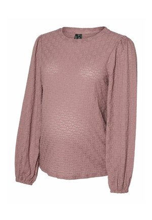 Mammatröja med lång ärm i mjukt rosa strukturerat tyg. Har en rund halsringning och puffärmar med veckade manschetter.