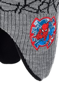 Gray knit beanie with a Spider-Man patch featuring red and blue accents. The texture is ribbed, with a smooth black lining and logo detail.