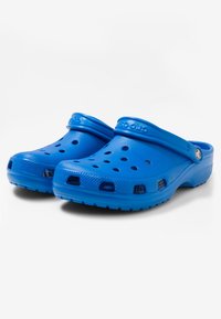 Crocs CLASSIC UNISEX - Mulas - blue