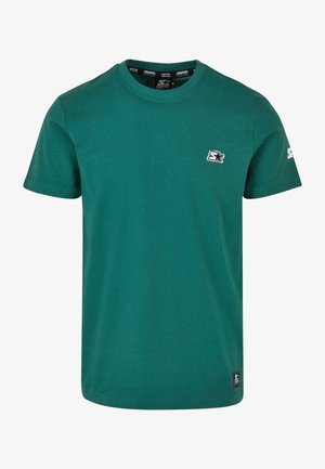 Teal cotton t-shirt with a crew neck, short sleeves, and a small white logo on the chest. Features a straight hem and soft texture.