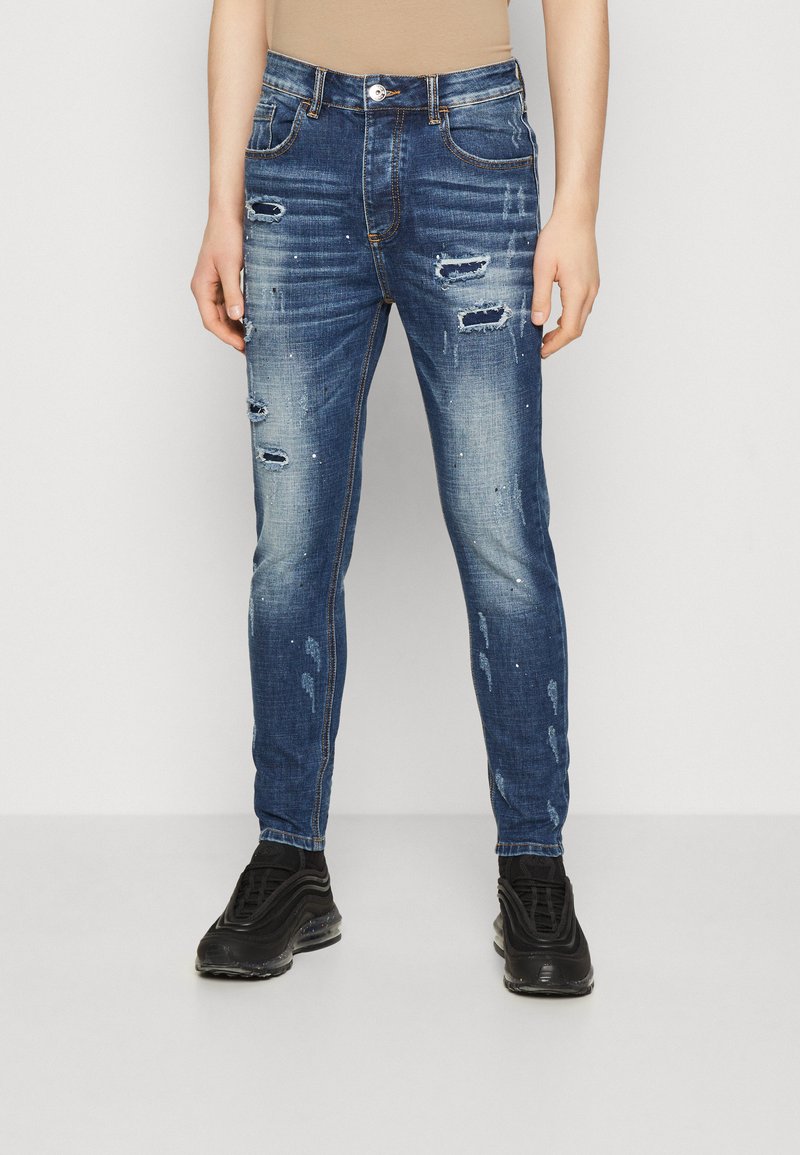 Kings Will Dream ROCKET CARROT FIT Jeans Slim Fit mid wash/schwarz