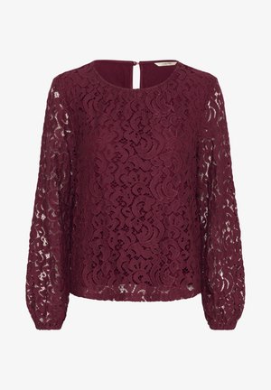 Burgundi pitsaga pikkade varrukatega pluus, ümmargune kaelus ja võtmeauku kinnitusega seljaosa. Tootes on keerukas lillemuster. Tekstuuriga, läbipaistev kangas.