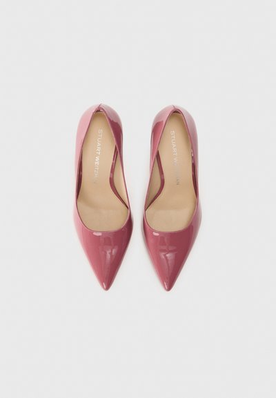 Pointed-toe high heels in glossy deep pink patent leather, featuring a smooth interior and subtle branding on the insole.