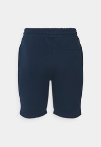 Laivastonsiniset shortsit pehmeästä kankaasta. Varustettu joustavalla vyötärönauhalla, kahdella sivutaskulla ja yhdellä takataskulla. Yksinkertainen, virtaviivainen muotoilu.