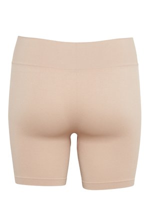 Shorts extensibles beiges avec une texture lisse, une taille haute et une longueur mi-cuisse. Aucune couture ni motif visible.