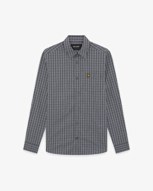 Fekete-fehér kockás, hosszú ujjú, gombos ing gallérral és egy kis sárga logóval a bal mellrészen.