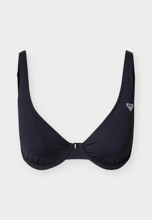 Top bikini nero con ferretto, spalline larghe e piccolo logo argentato sul lato sinistro, mostrato su sfondo grigio chiaro.