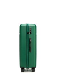 Green hard-shell suitcase with a textured surface, black hardware, and a combination lock. Four wheels for mobility and a side handle.