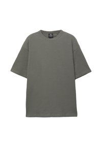 Olivengrøn t-shirt lavet af tekstureret bomuld, med rund hals og korte ærmer. Casual, løs pasform med ensfarvet design.