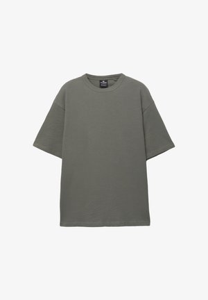 Olijfgroene t-shirt van gemêleerd katoen, met een ronde hals en korte mouwen. Casual, losse pasvorm met een effen kleur ontwerp.