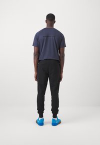 ICANIWILL STRIDE RAGLAN - T-skjorte til trening - navy