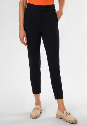 Navy tailored trousers, slim fit, featuring a smooth texture, front pockets, and two decorative buttons on the waistband.