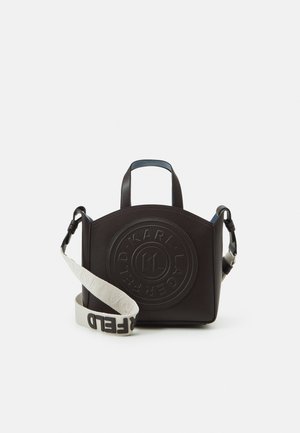 Black leather handbag with embossed logo, rounded shape, two short handles, and a removable shoulder strap featuring logo details.
