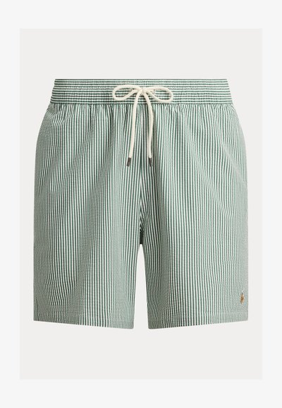 Shorts à rayures verticales vertes et blanches avec une taille élastique et un cordon blanc à l'avant.