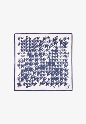 Bufanda de color azul marino con un diseño moderno de pata de gallo sobre un fondo crema claro, rematada con un borde azul marino.