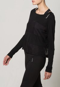 Reebok Långärmad tröja - black