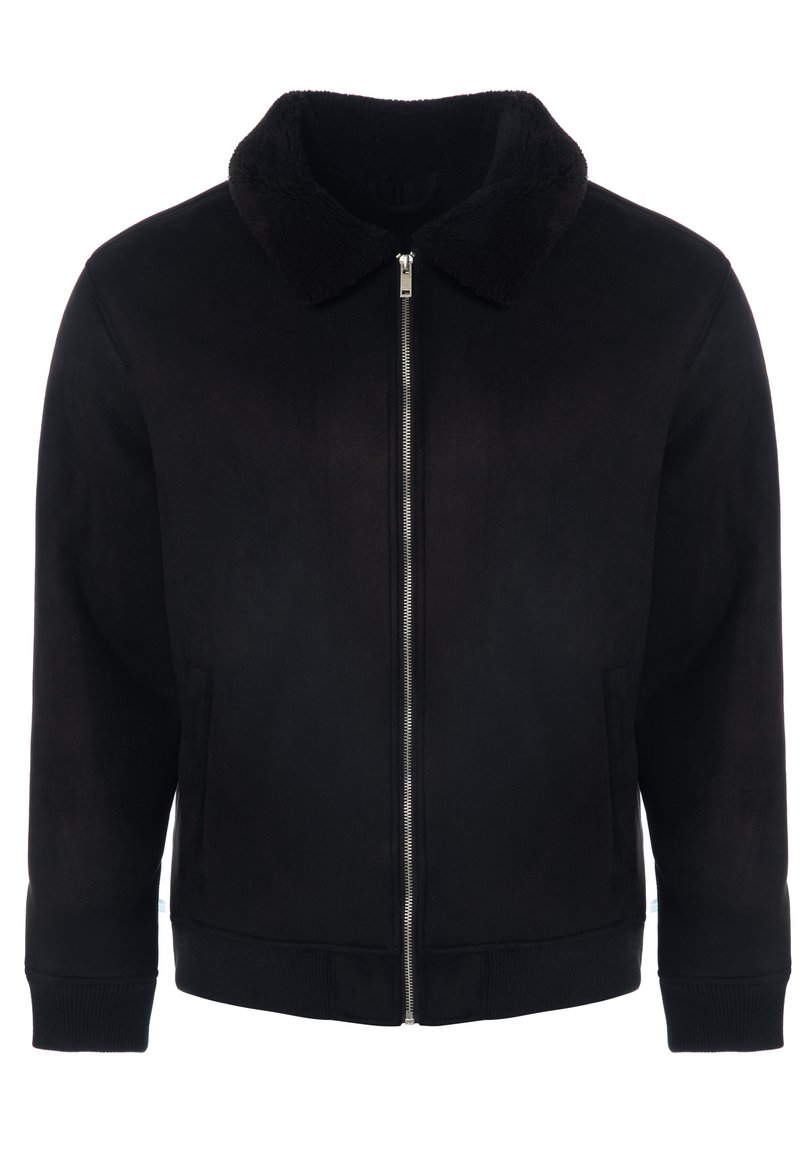 Črna jakna iz mehke tkanine, z mehkim ovratnikom, zadrgo po celotni dolžini in rebrastimi manšetami. Ima preprost, poenostavljen dizajn.