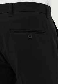 Next SKINNY FIT PLAIN - Pantaloni - black