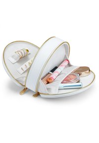 Estuche redondo de maquillaje de cuero blanco con cremallera dorada, que cuenta con compartimentos organizados para anillos, cosméticos y un forro interior suave.