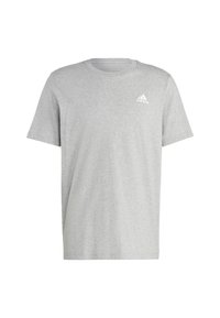 Camiseta de algodón gris con cuello redondo. Presenta mangas cortas y un pequeño logo blanco de Adidas en el área del pecho izquierdo.