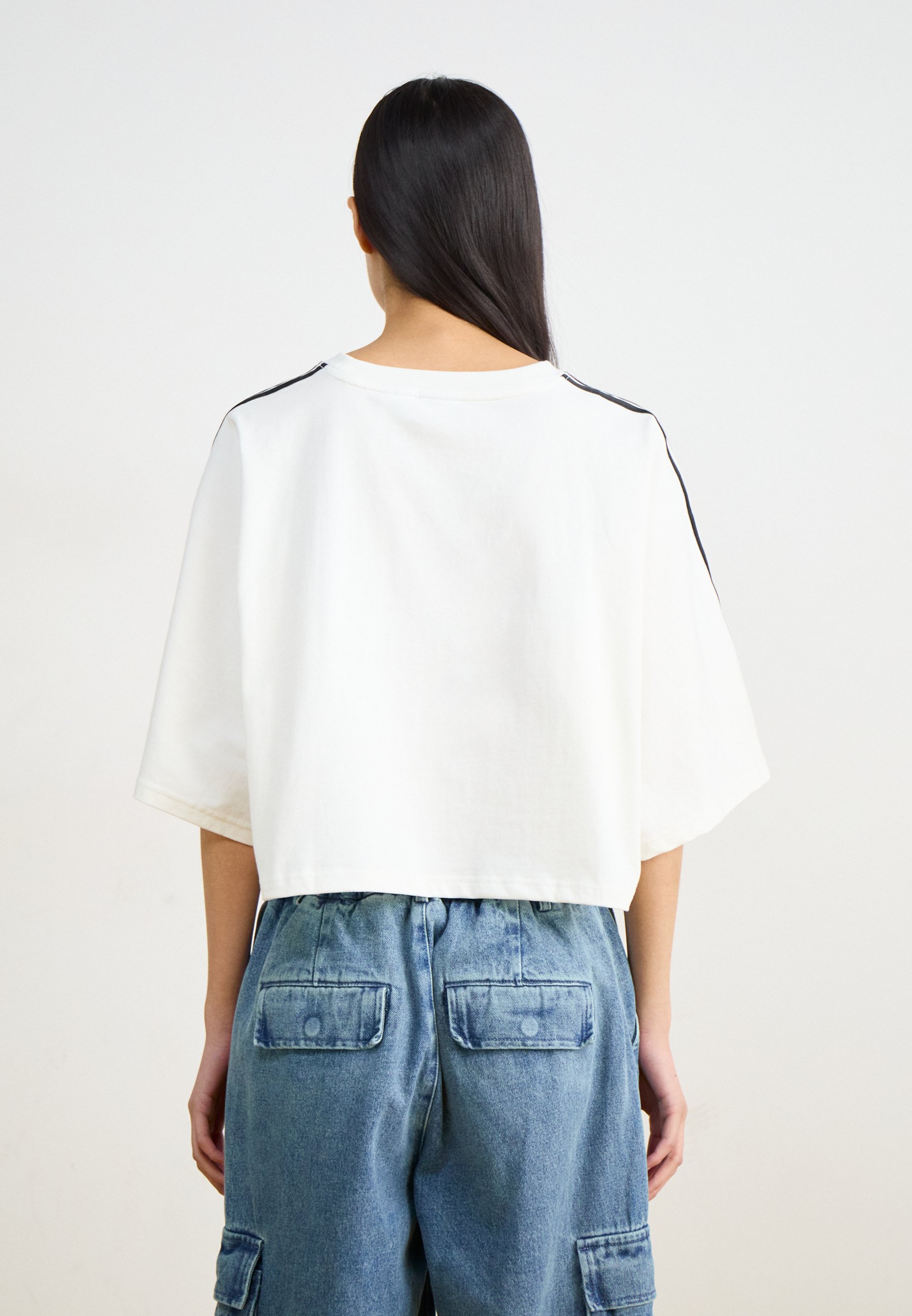 ★★Adairs★★ ADILENIUM 3 Boxy Oversized Tee White JY8886 Adilenium Season 3 Boxy Oversized T-Shirt – Stirling Sports