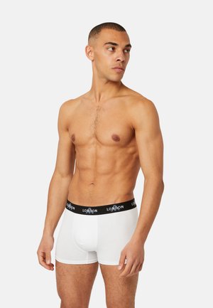 White cotton boxer shorts with a black elastic waistband featuring "LONDON" in repeated text; smooth texture, fitted design.