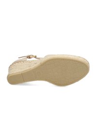 Beige wedge sandal with textured, woven upper and smooth sole. Features a small strap with a gold-tone buckle. Flat, grooved sole design.