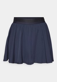 Morska suknja s crnim elastičnim pojasom. Ima nabore koji daju oblik lepršavog kroja. Glatka, lagana tkanina u jednobojnoj boji.