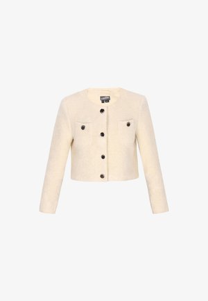 Kreminės spalvos trumpa striukė, pagaminta iš tekstūruoto audinio, su ilgomis rankovėmis, dviem priekinėmis kišenėmis ir juodais mygtukais.