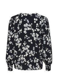 Blusa floreale di colore blu navy con fiori bianchi e grigi chiari. Presenta maniche lunghe e puffate e un collo rotondo. Tessuto morbido e leggero.