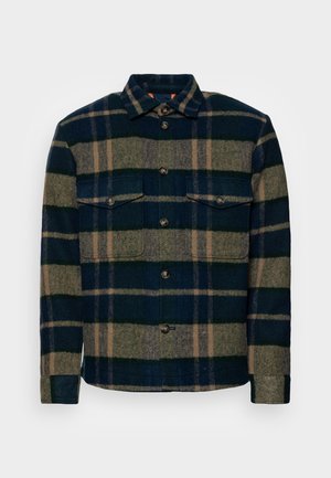 Flanellhemd in Marineblau und Olivgrün kariert mit beigen Streifen. Verfügt über zwei Brusttaschen und eine vorn zuknöpfbare Verschlussleiste. Weiche Textur.