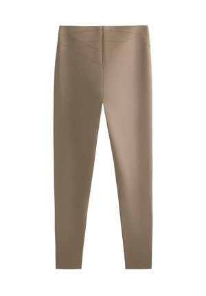 Leggings in een lichtbruine kleur, met een gladde textuur, hoge taille en diagonale stikselaccenten op de achterkant.