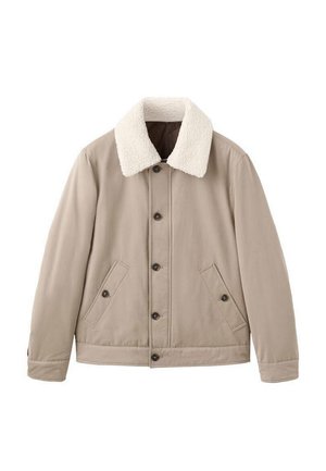 Beige jacket with a textured white fur collar, front button closure, and two side pockets, featuring a smooth exterior and tailored fit.