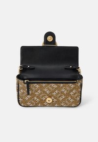 Brown and gold patterned handbag with a black leather interior, zip pocket, gold hardware, and a front snap closure. Compact rectangular shape.