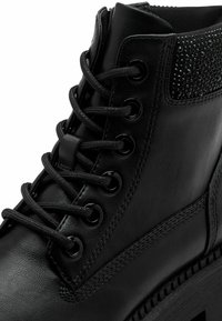 Tamaris Vinterstøvler - black glam