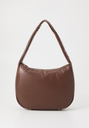 Brown leather handbag with a curved shape, a single padded handle, and a small front logo detail. Features a zip closure and gold hardware accents.