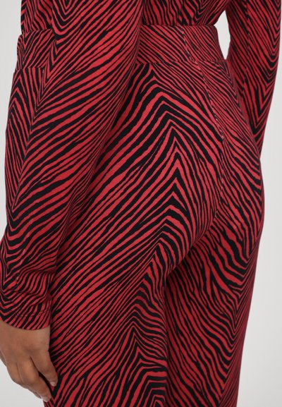 Stieglitz MISO FLARED LEGGINGS - Leggings - Trousers - red