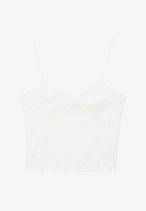 Bijeli čipkani kratki top s podesivim tankim naramenicama i žičanim košaricama s cvjetnim uzorkom s izrezima.