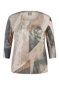 Langärmliges Oberteil mit einem abstrakten Muster in Beige, Grau und Schwarz. Weicher Stoff mit Rundhalsausschnitt und metallischen Akzenten.