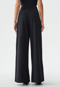 CALLI GEMMA  - Broek - black
