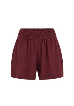 Shorts amples bordeaux avec taille élastique froncée et tissu léger, adaptés à une tenue décontractée.
